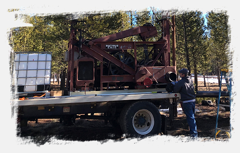 Driller preparing drilling truck for a water well
